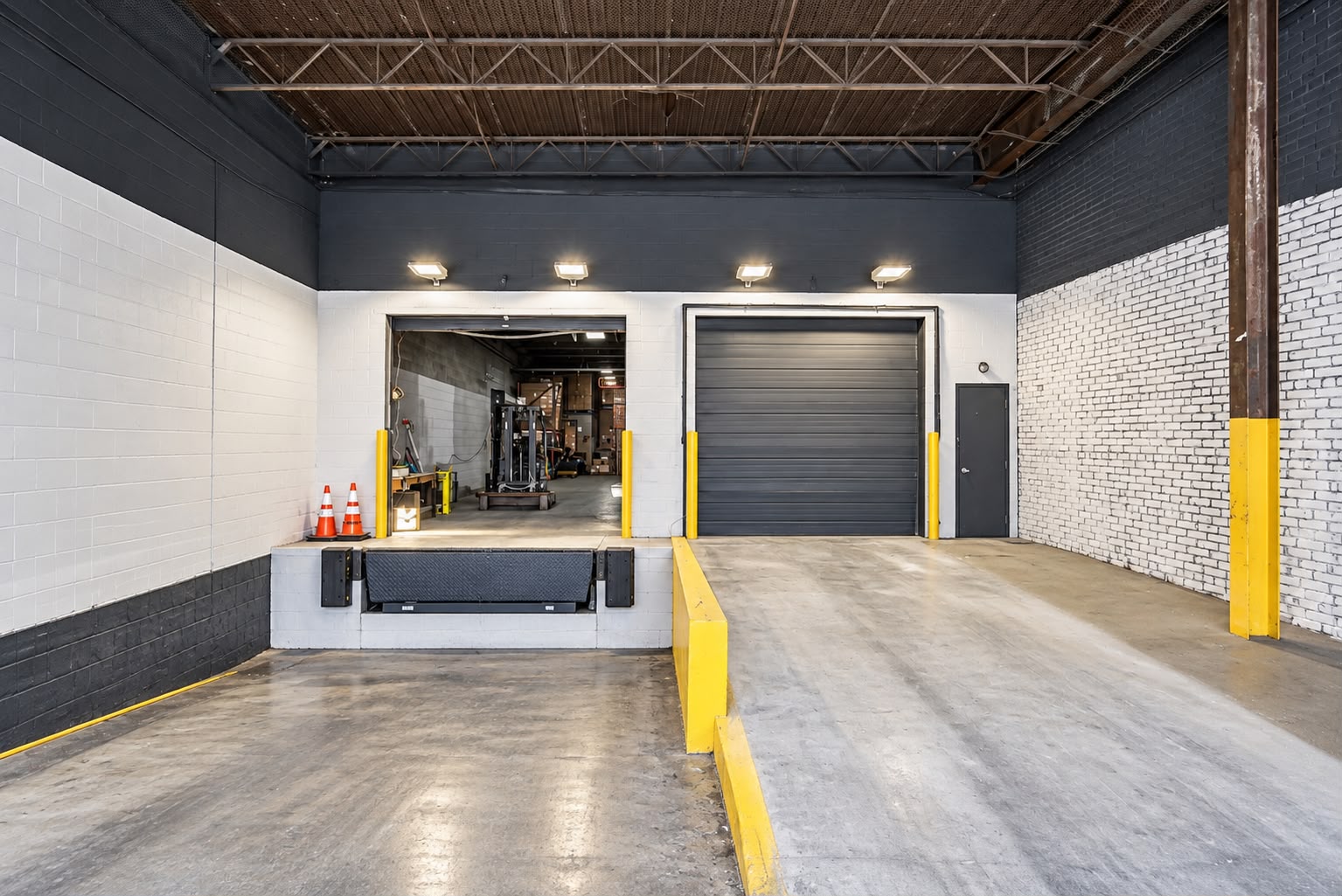 Rentable loading dock door and overhead drive-in door at the JA Philadelphia warehouse